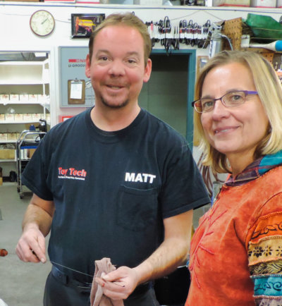 Toy Tech shop Matt with a customer
