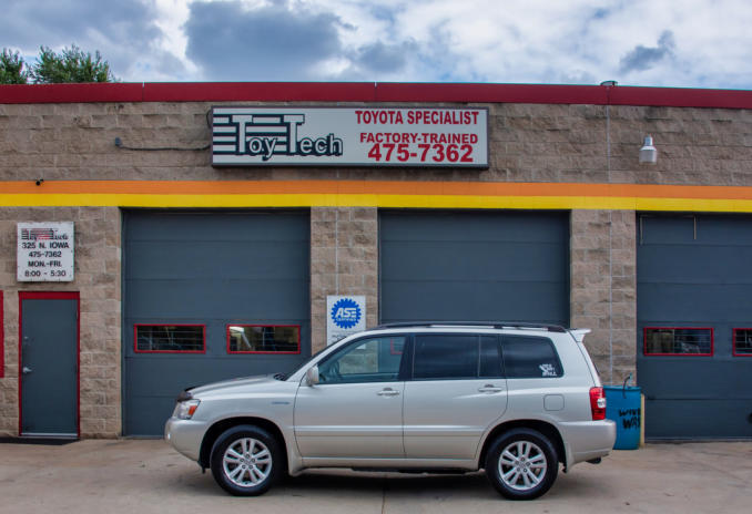 Front of Toy Tech with parked SUV